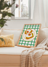 Farbenfrohes Wandbild, das ein herzhaftes Frühstück mit Eiern darstellt. Erhältlich auf kudeko.com