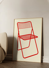 Cuadro decorativo de estilo minimalista y geométrico colocado en oficina, silla roja de diseño minimalista, modelo Ted Net Chair Red