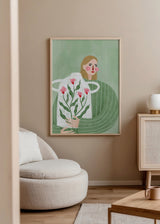 Quadro ilustrado colorido com mulher e jarra com flores cor-de-rosa, de Bea Muller. Disponível em kudeko.com