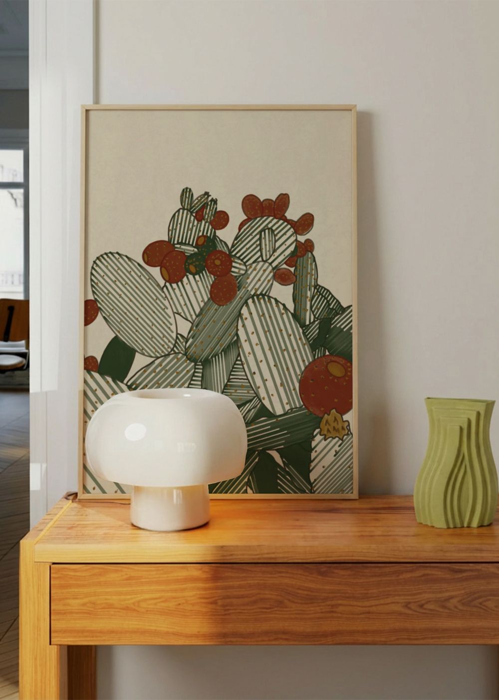Cuadro decorativo de estilo minimalista y orgánico colocado en salón, ilustración de chumberas con frutos en tonos tierra, modelo Chumberas cactus