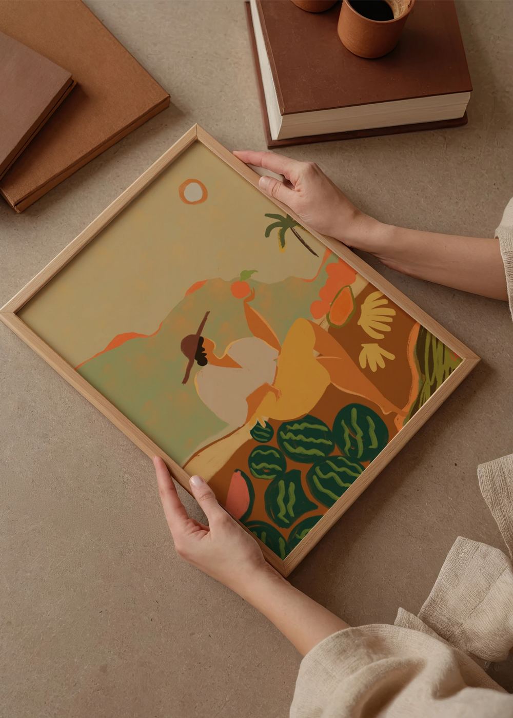 Quadro decorativo de estilo minimalista e orgânico colocado numa sala de estar, mulher tropical com fruta numa paisagem quente, modelo Farmer Guava. Disponível em kudeko.com