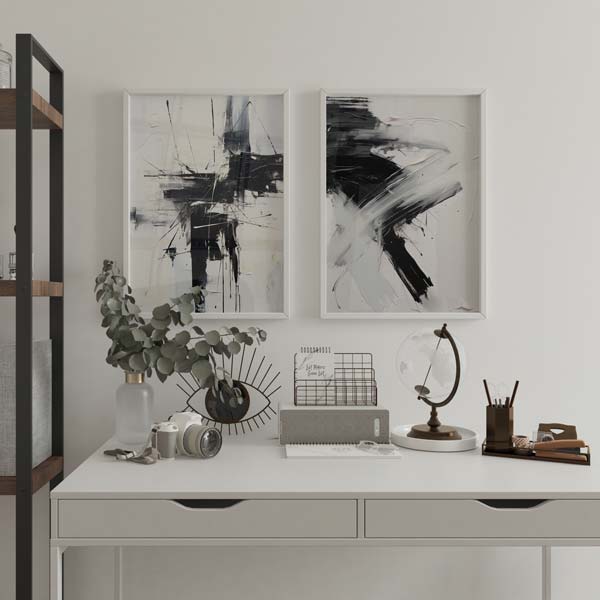 Ensemble de deux tableaux avec composition abstraite en blanc, noir et gris, lignes fines, formes larges et contraste marqué sur fond clair, dans un style contemporain. Disponible sur kudeko.com