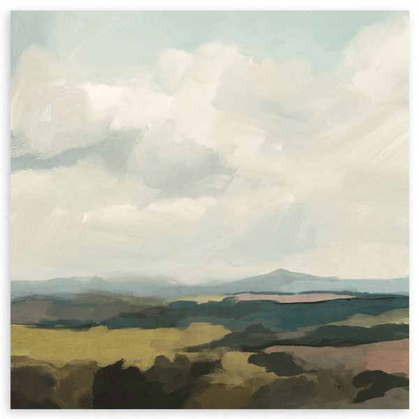 Tableau carré avec paysage de collines diffuses, champs beige et vert olive, ciel nuageux bleu gris et style naturel contemporain pour décoration murale. Disponible sur kudeko.com