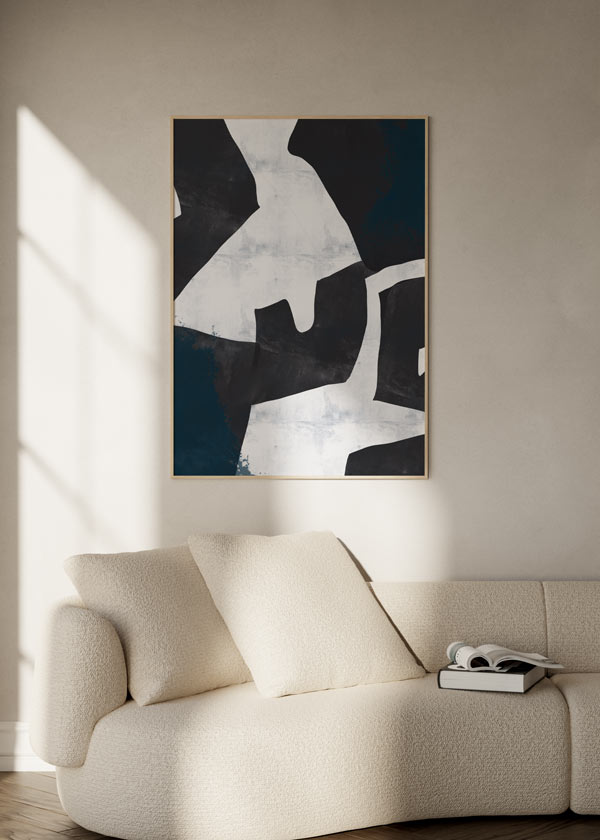 Cuadro abstracto en blanco y negro con formas irregulares, en marco negro, kudeko.com
