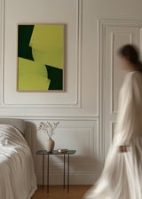 Cuadro abstracto geométrico en tonos verde y amarillo con marco negro, kudeko.com
