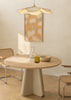 Tableau avec composition abstraite de formes superposées en tons moutarde, beige, crème et blanc cassé, texture visuelle douce et style contemporain apaisant. Disponible sur kudeko.com