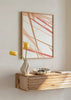 Cuadro decorativo de estilo minimalista y abstracto colocado en salón, composición abstracta de líneas diagonales en tonos coral, modelo Expressions III