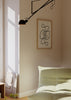 Quadro com linha preta contínua, curvas abstratas e laçadas sobre fundo bege claro, composição limpa de estilo minimalista para decoração de parede. Disponível em kudeko.com
