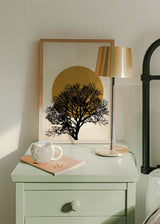 Cuadro decorativo de estilo minimalista y blanco_y_negro colocado en salón, árbol en silueta al atardecer, modelo Cálido Atardecer