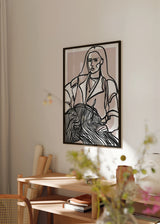 Tableau encadré avec portrait féminin en lignes noires continues, fond beige rosé et blanc, composition contemporaine au style minimaliste et épuré. Disponible sur kudeko.com