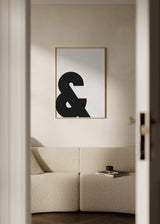 Cuadro decorativo de estilo minimalista y blanco_y_negro colocado en salón, símbolo tipográfico moderno en blanco y negro, modelo & Moderna