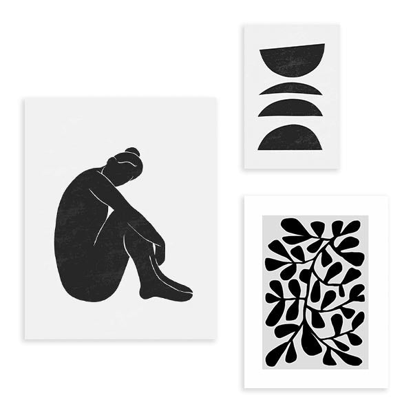 Conjunto de tres cuadros con figura femenina abstracta, formas geométricas semicirculares y composición botánica negra sobre fondo blanco, de estilo minimalista. Disponible en kudeko.com