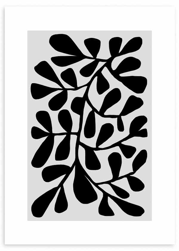 Quadro emoldurado com ramos e folhas pretas de formas orgânicas sobre fundo branco, composição botânica contrastante, estilo abstrato e paleta a preto e branco. Disponível em kudeko.com